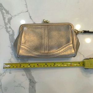 New without tag. Coach leather clutch/wristlet